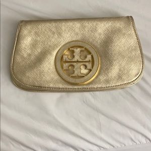 Tory Burch gold clutch